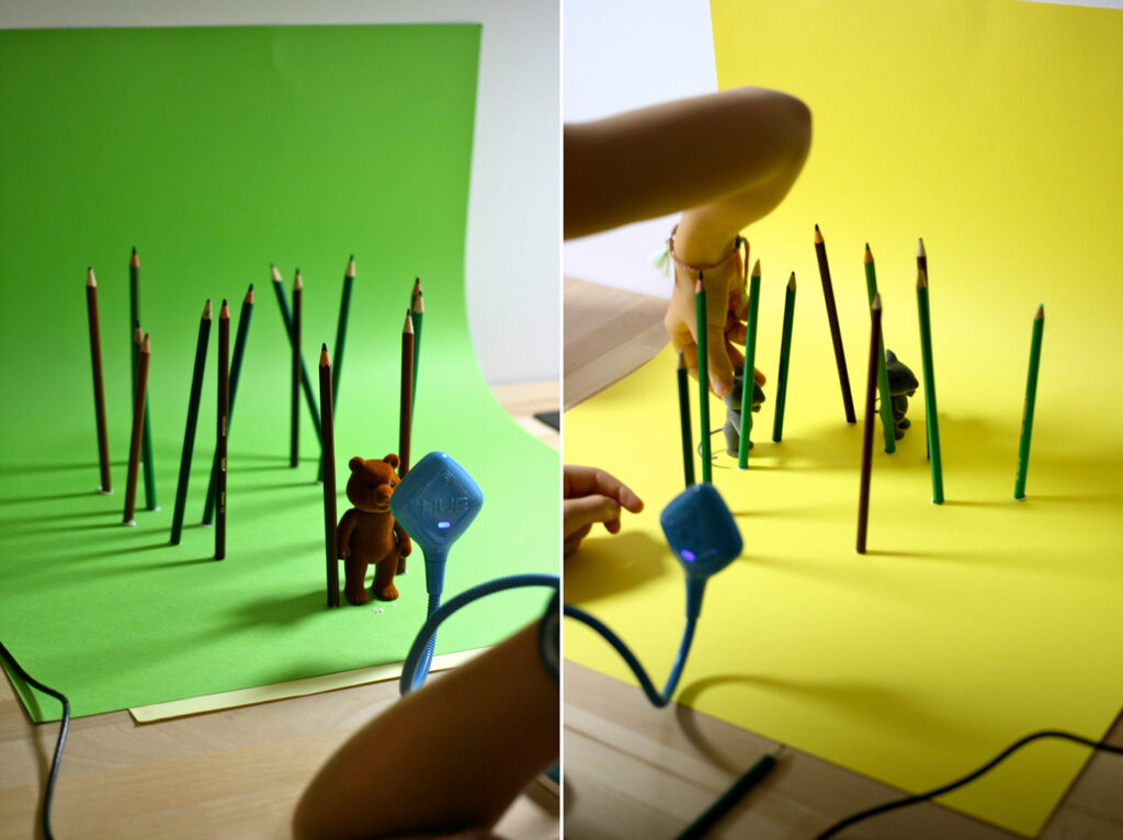 The HUE HD Pro camera being used for stop motion animation with green and yellow backgrounds