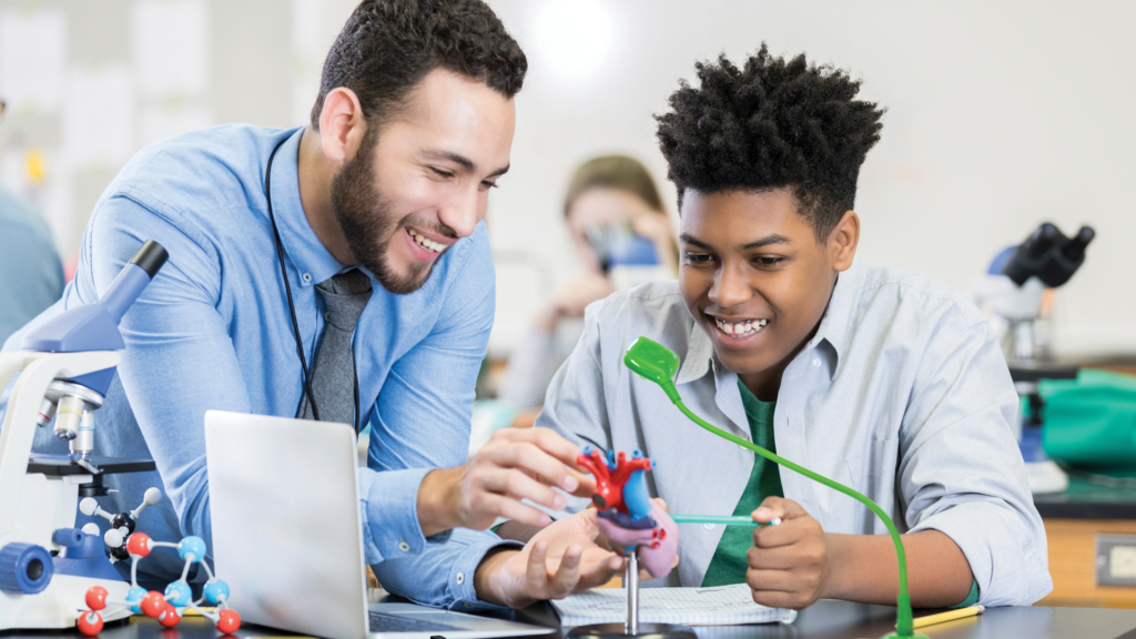 A green HUE HD Pro camera in use in a classroom