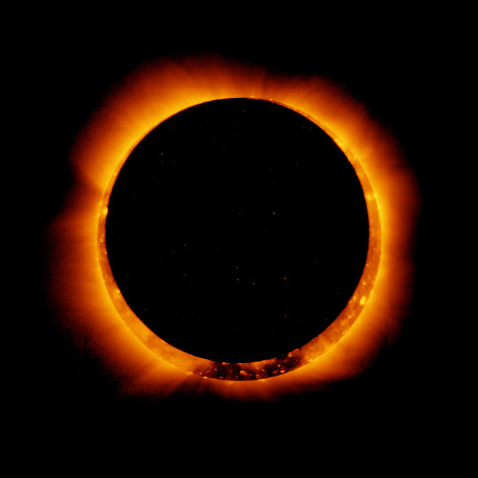 Photo of an annular solar eclipse taken by the solar optical telescope Hinode as the Moon came between it and the Sun. Source: JAXA/NASA