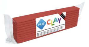 A bar of red HUE Clay marked with the HUE branding and conformity information